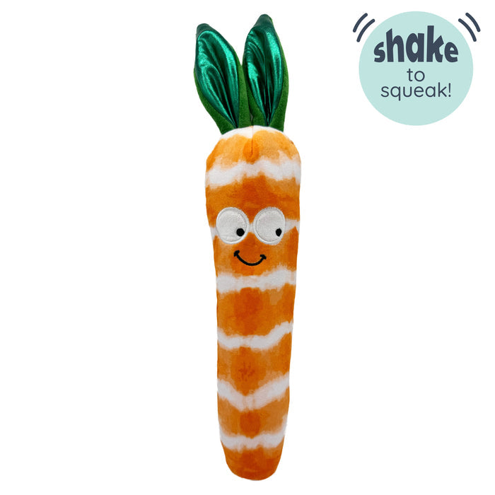 Dog with Fetchies® Sweet Carrot Dog Toy on a white background.