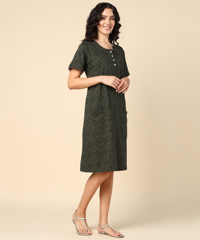 Woman wearing Forest Green Zipless Feeding Dress in Green - Pre & Post Pregnancy