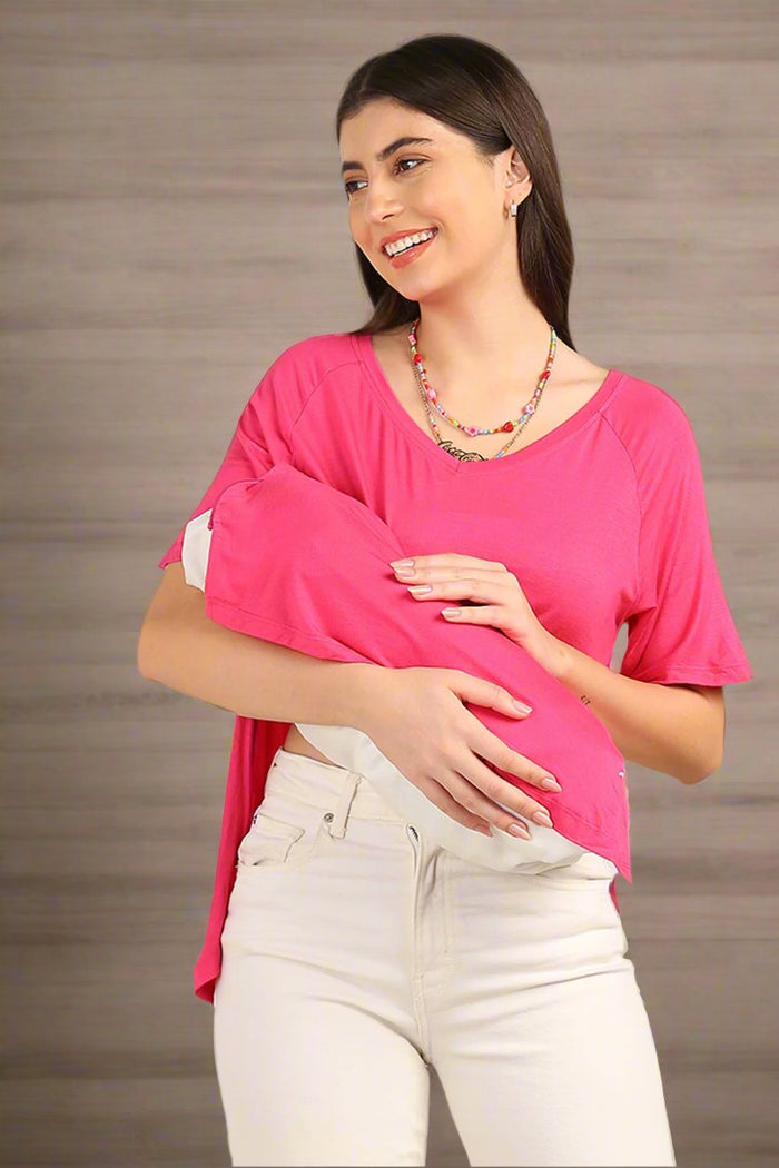 Model wearing Fuchsia Solid Top; garment provides coverage and fit for a changing body.