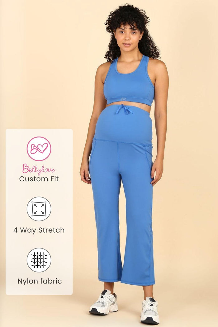Model wearing Blue Flair Pants; flair leg ensures movement and style.