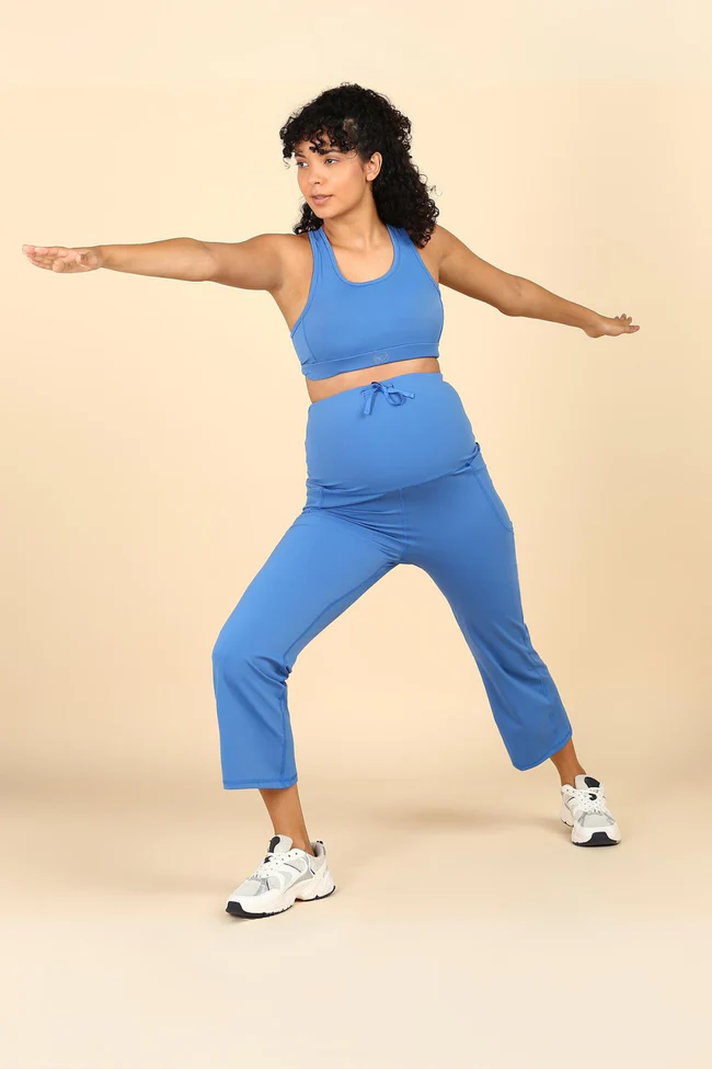 Blue Pants material; fabric allows stretch to fit body size changes.