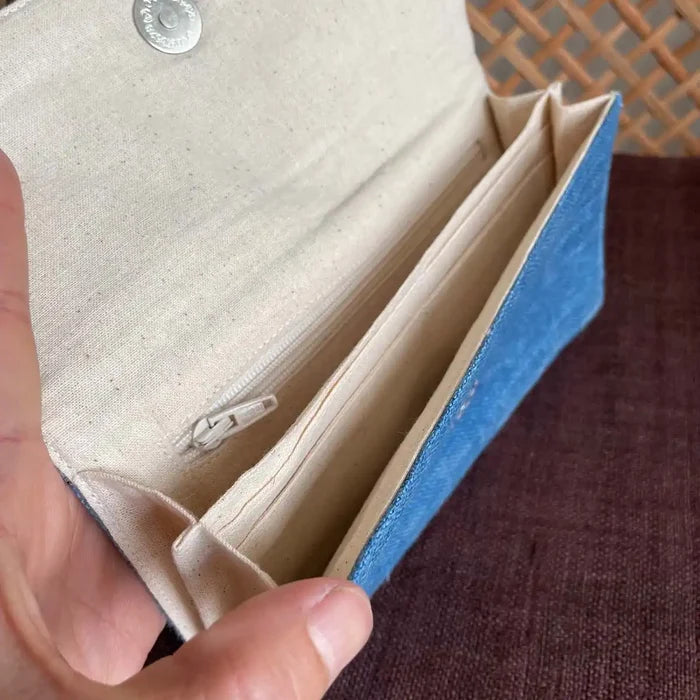 Vindigo long purse denim blue hemp diamond eye pattern inside view with hand