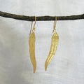 Handmade gold plated sterling silver leaf earrings with long textured botanical design – lightweight artisan gold jewelry gift for women