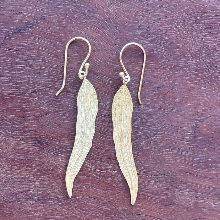 Handmade gold plated sterling silver leaf earrings with long textured botanical design – lightweight artisan gold jewelry gift for women