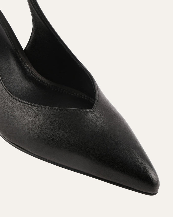 Black pointed-toe shoe on a white background