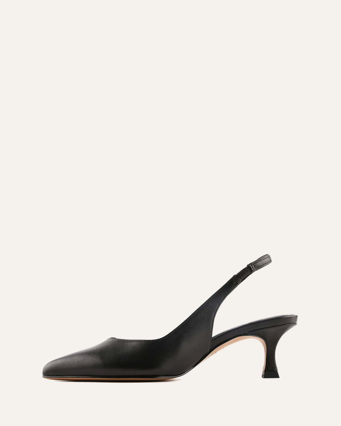 Black slingback shoe on a white background