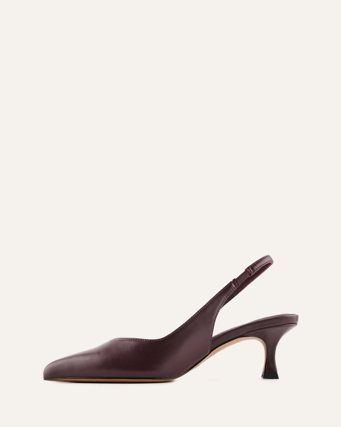 Purple slingback shoe on a white background