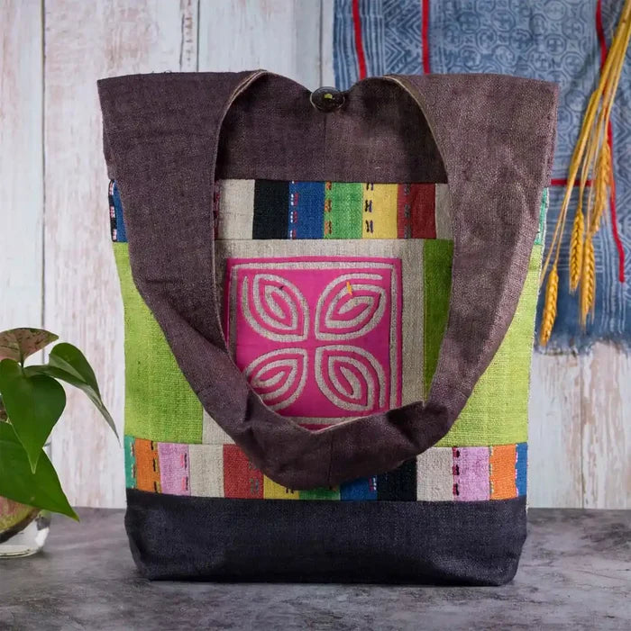 Vindigo shoulder bag brown hemp pink spiral patch hanging front view
