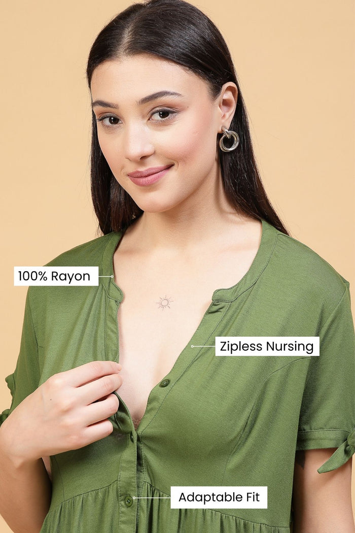 Model wearing Green Solid Top; garment provides coverage and fit for a changing body.