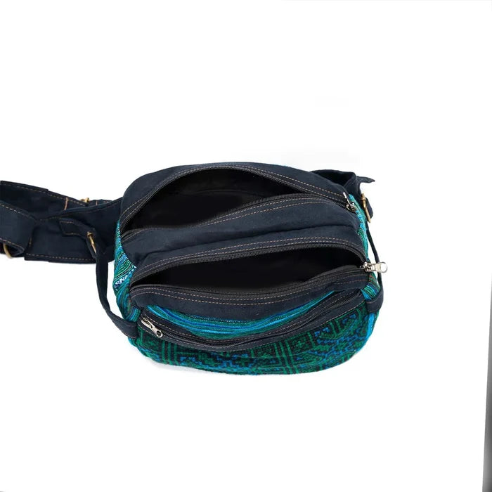 Vindigo green suede waist bag top zipper view showing roomy compartments