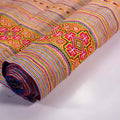 Vindigo orange striped cotton tribal embroidered fabric roll side angle