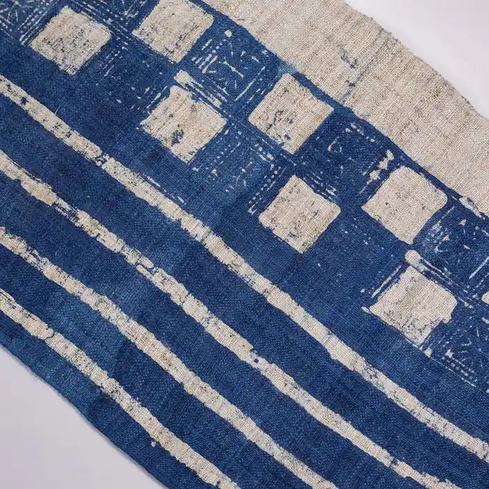 Vindigo indigo striped check fabric roll close-up texture