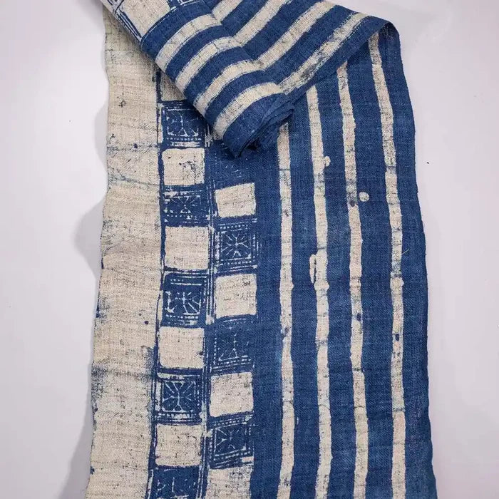 Vindigo indigo fabric roll top-down view with block print