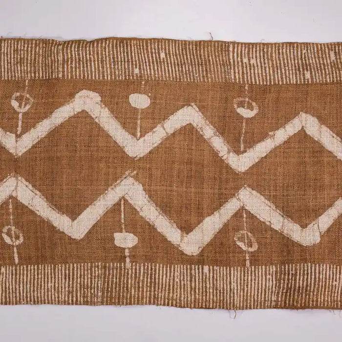 Vindigo brown tribal zigzag fabric roll flat view