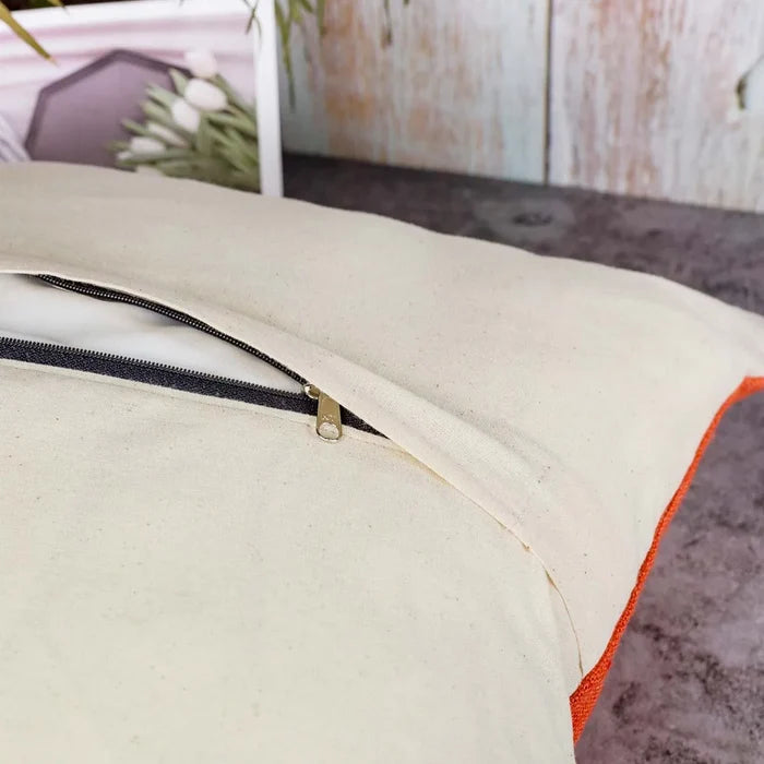 Vindigo cushion cover orange striped spiral zipper detail view