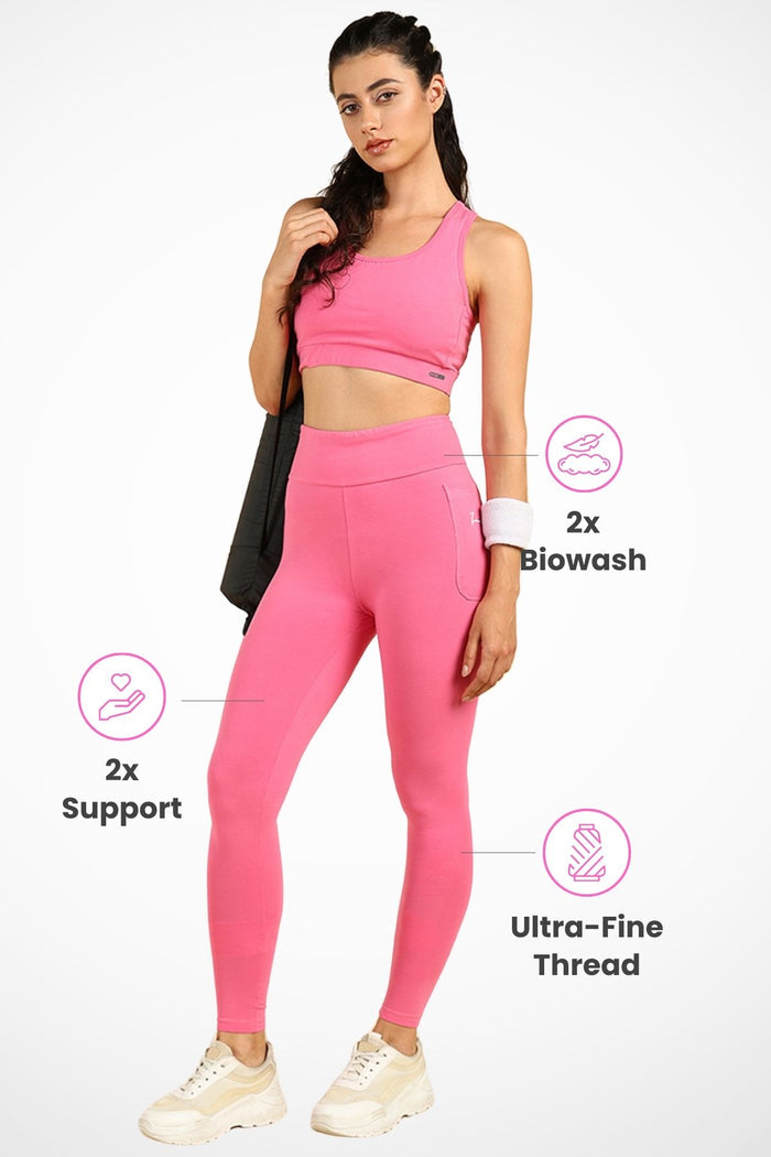 Model wearing Pink Legging; waist band holds body securely and comfortably.
