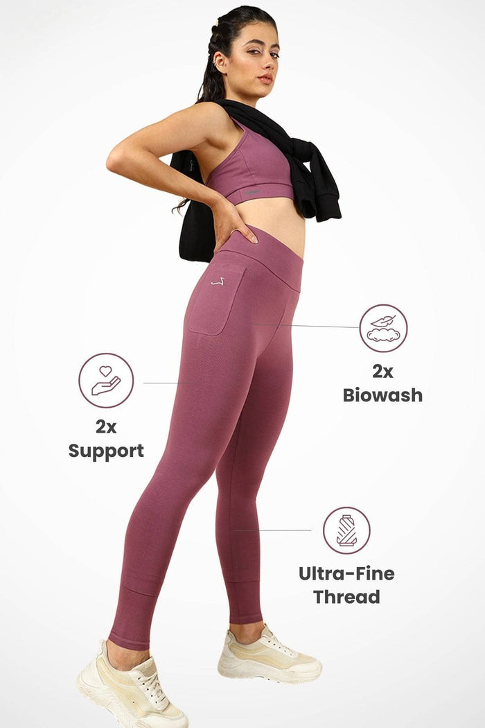 Model wearing Rosewood Legging; waist band holds body securely and comfortably.