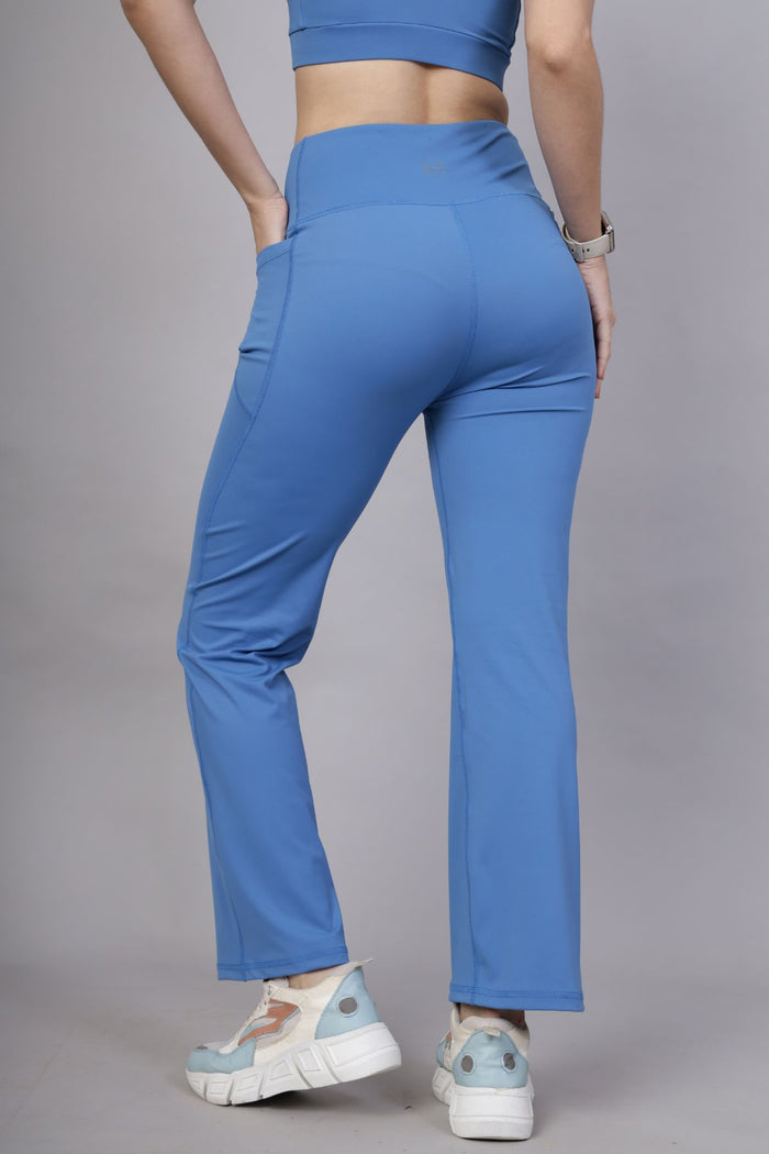 Model wearing Blue Pants; smooth fit ensures comfortable wear under any top.
