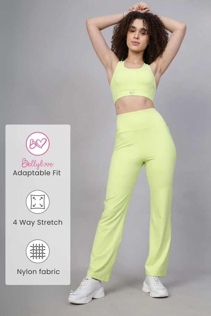 Model wearing Lime Pants; high waistband provides gentle compression support to the core.