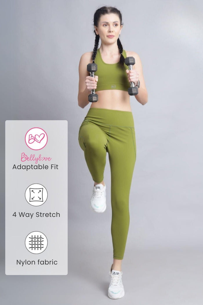 Model wearing Olive Leggings; high waist provides gentle compression support.