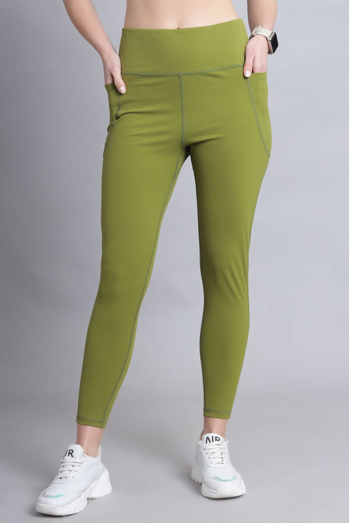 Model wearing Olive Leggings; suitable for light exercise and active recovery.