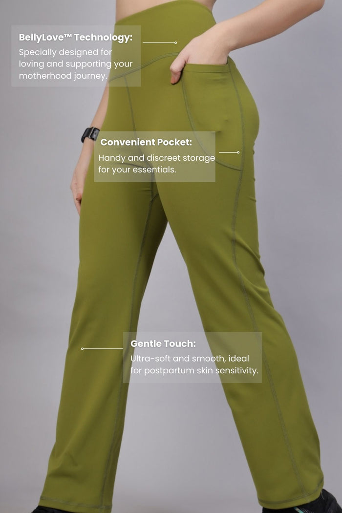 Model wearing Olive Pants; high waistband provides gentle compression support.
