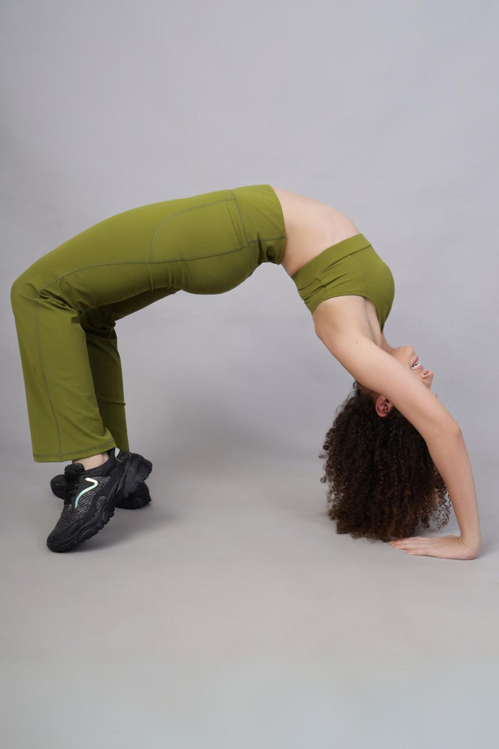 Olive Pants fit; gentle compression aids in postpartum core recovery.
