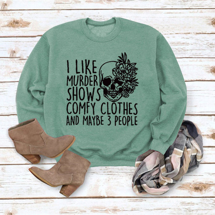 Light green sweater (black font) / S