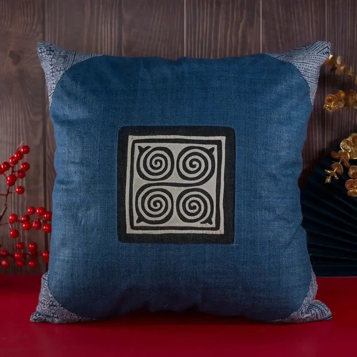 Vindigo blue hemp cushion cover with indigo batik corners and white spiral design