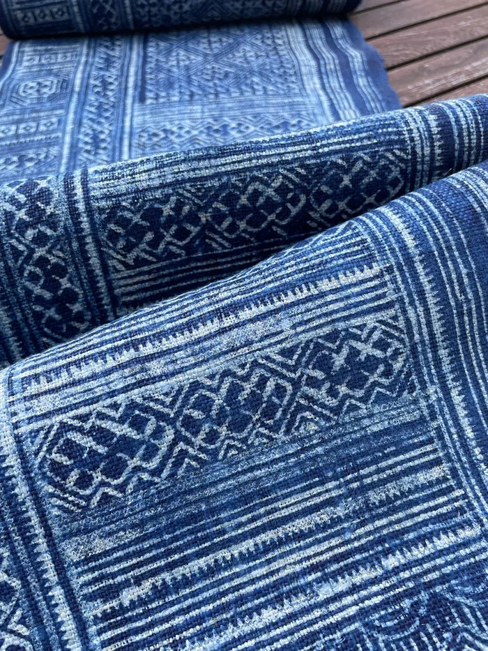 Intricate labyrinth pattern in handwoven hemp, indigo batik