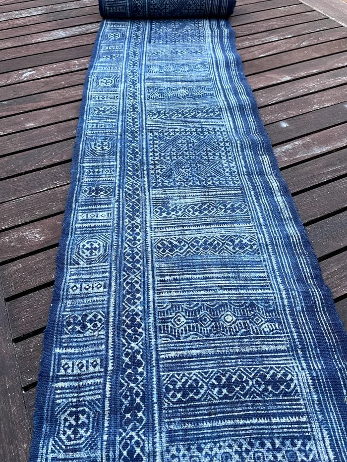 Intricate labyrinth pattern in handwoven hemp, indigo batik