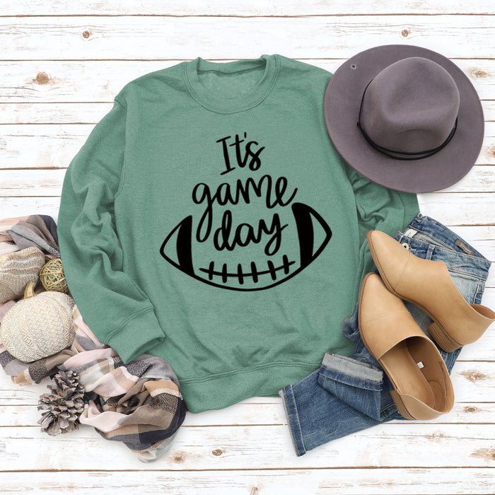 Light green sweater (black font) / S