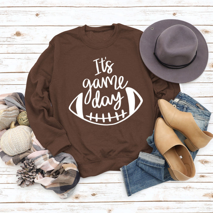 Brown sweater (white font) / S