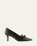 Black high-heeled shoes with a bow on a white background