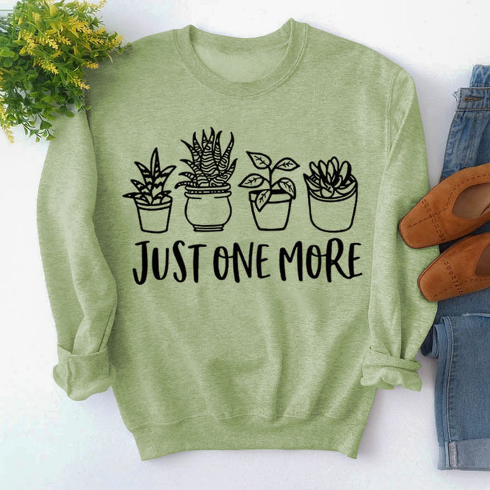 Olive green sweater (black font) / S