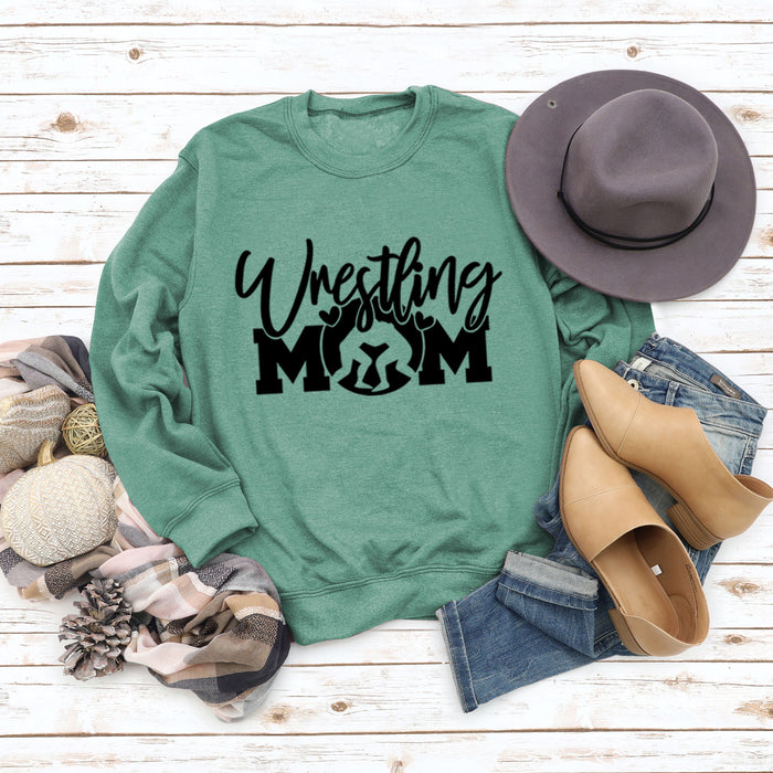 Light green sweater (black font) / S
