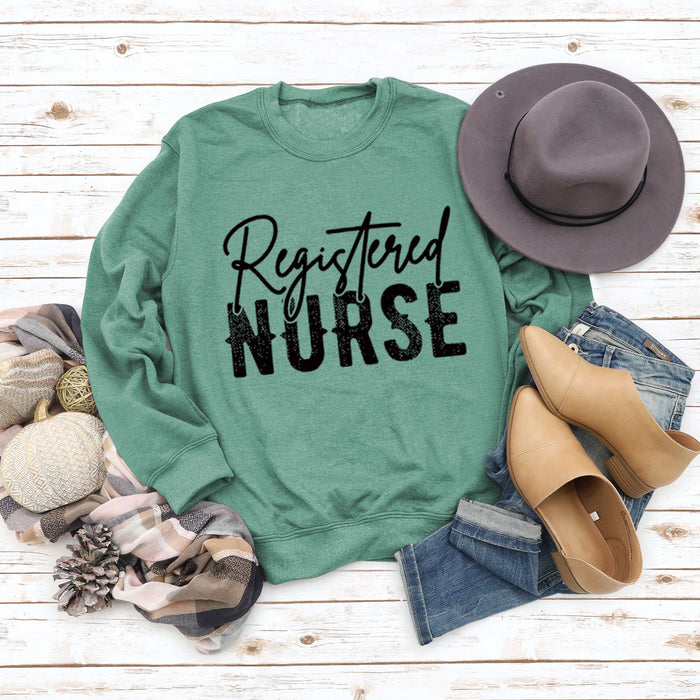 Light green sweater (black font) / S