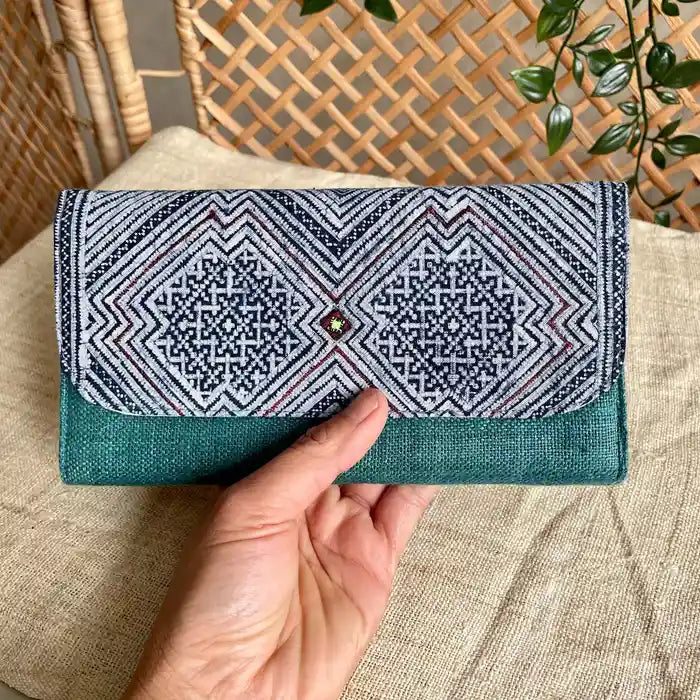 Vindigo long purse turquoise hemp pattern front view with hand