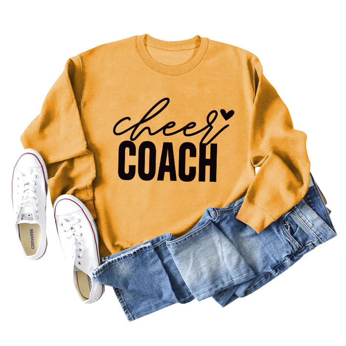 Yellow sweater (black font) / S