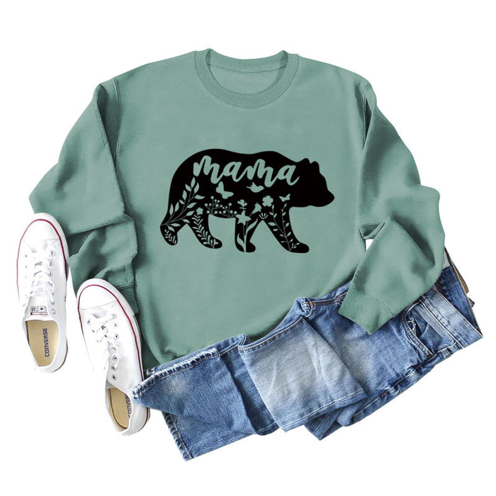 Light green sweater (black font) / S