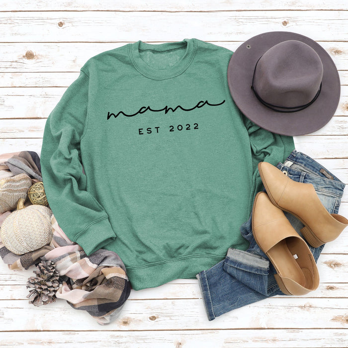 Light green sweater (black font) / S