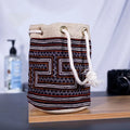 Vindigo brown embroidered canvas bucket bag side view