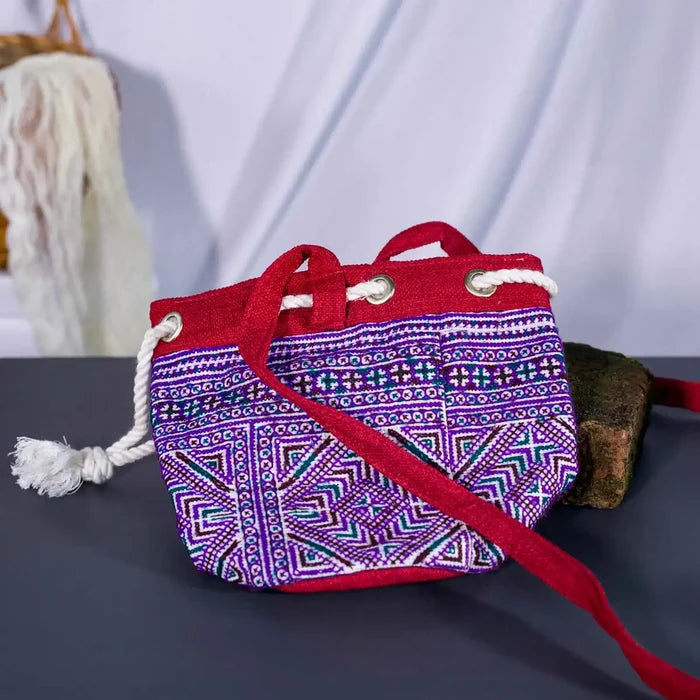 Vindigo red hemp geometric bucket bag lying flat detail view