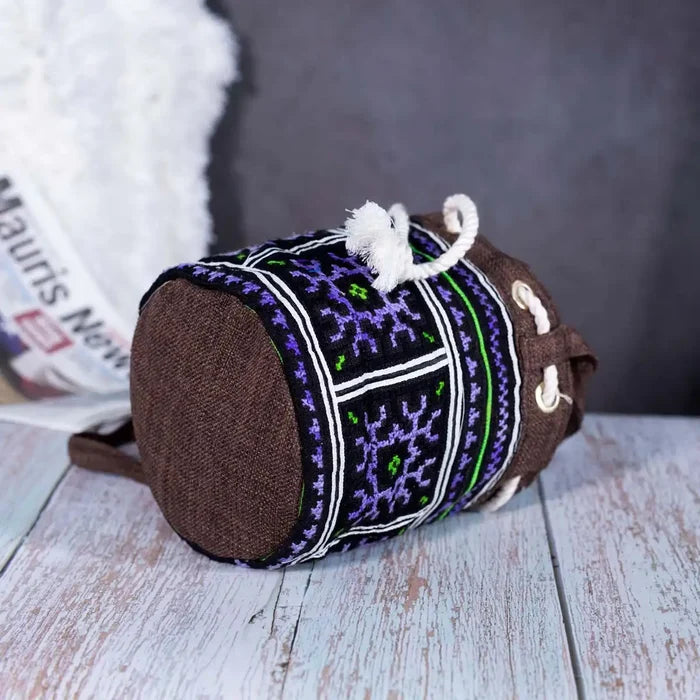 Bottom view of Vindigo brown hemp geometric embroidered bucket bag