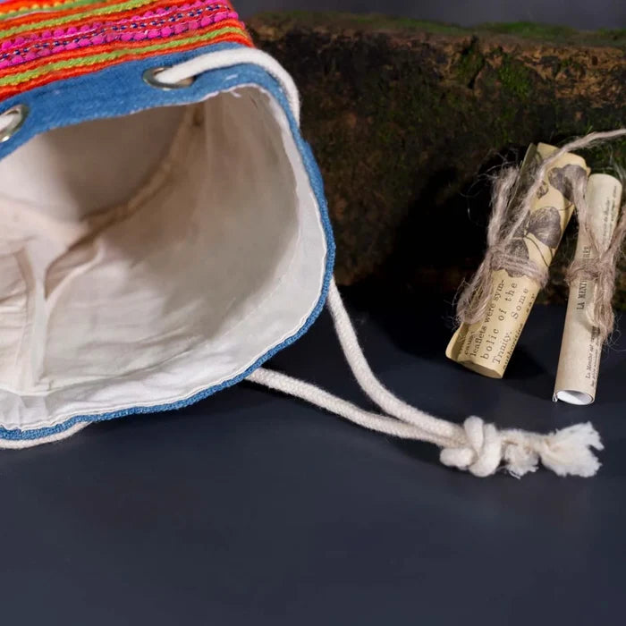 Vindigo orange embroidered canvas bucket bag inside fabric detail