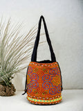 Neon blue and red embroidery shoulder bag with string to close
