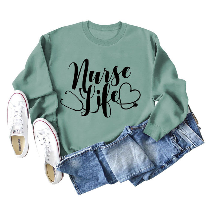 Light green sweater (black font) / S