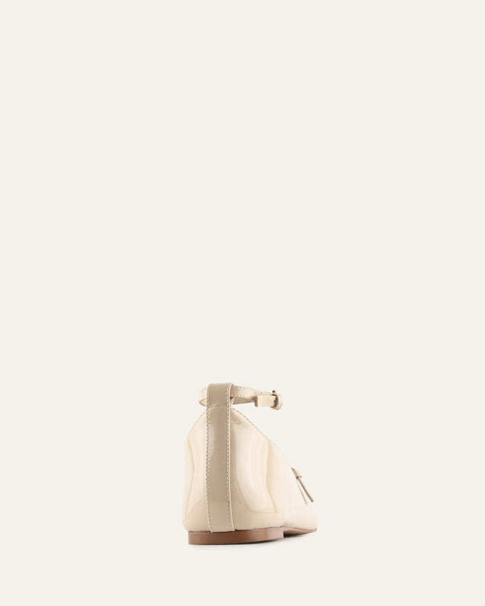 Beige wall sconce on a white background