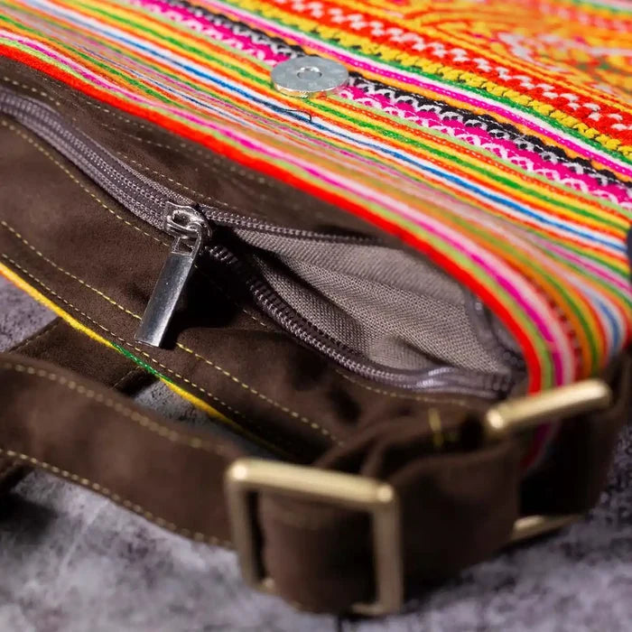 Vindigo hemp crossbody bag zipper and strap detail with brown buckle