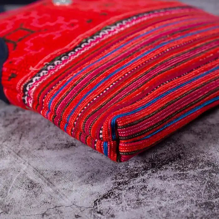 Vindigo red hemp crossbody bag bottom view showing detailed woven pattern
